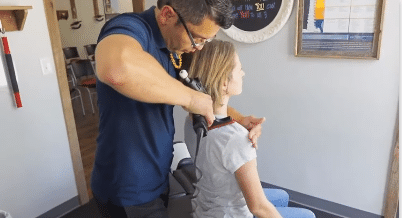 Dr. Oscar Noriega DC uses chiropractic tool to get relief from Headache